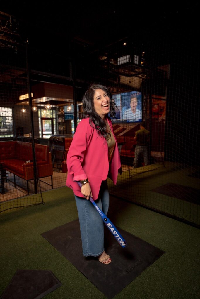Adults having fun at an indoor corporate event at Batbox Dallas sports entertainment venue